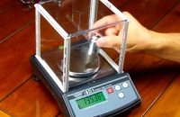 Weighing scale calibration procedure